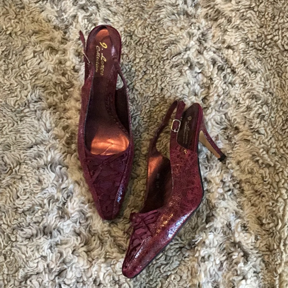 Reddish Burgundy with a cute, sexy lace up toe.